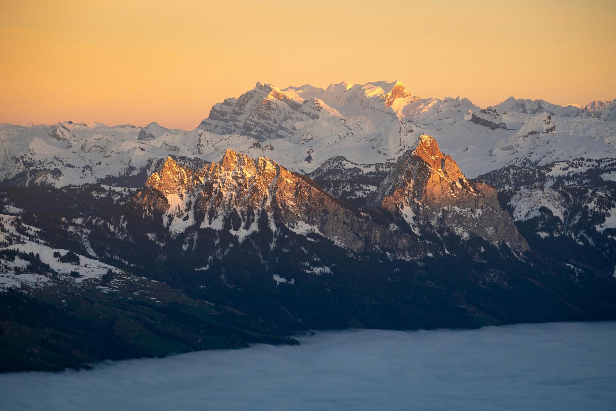 Snow on a mountain in sunset